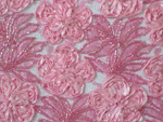 Click here for an enlarged view of the embroidered fabrics